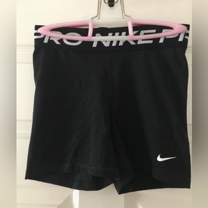 Black size small Nike pros